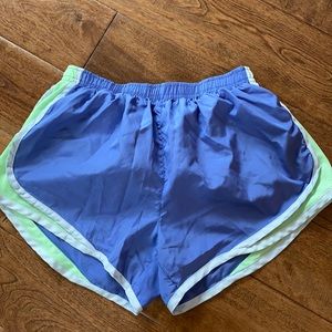 Purple and green running shorts